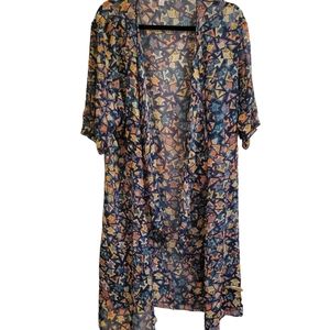 LulaRoe. Kimono. Size Medium. Sheer. Blue fun Multi-colored print. NWT.